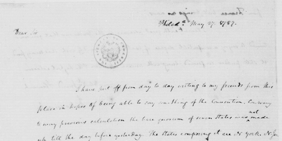 Color image of the top half of a letter showing brown ink on cream colored paper.