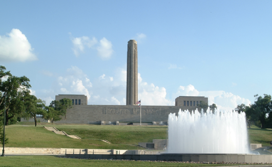Liberty Memorial Tall stone structure and a water fountain.