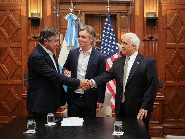 NPS & Argentina MOU Signing US and Argentina representatives shake hands after signing the MOU.