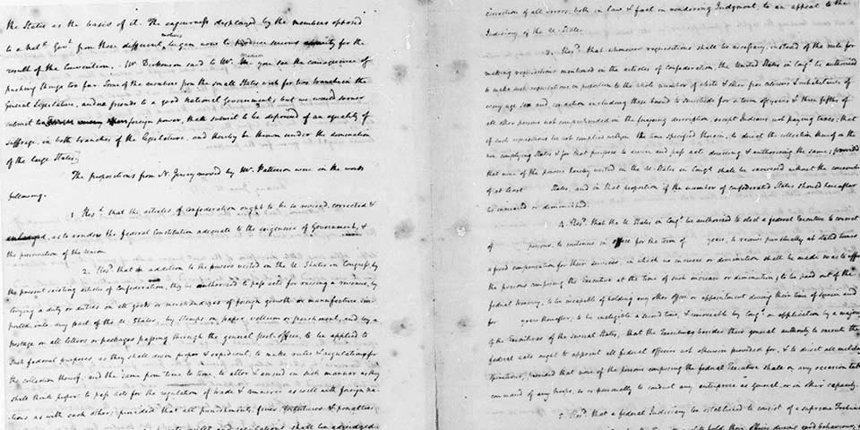 Color image of a manuscript showing handwritten notes in dark ink on white paper. Color image of a manuscript showing handwritten notes in dark ink on white paper.