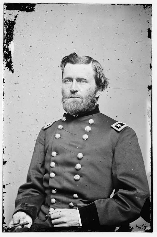 U.S. Grant posing for a photo in his general's uniform
