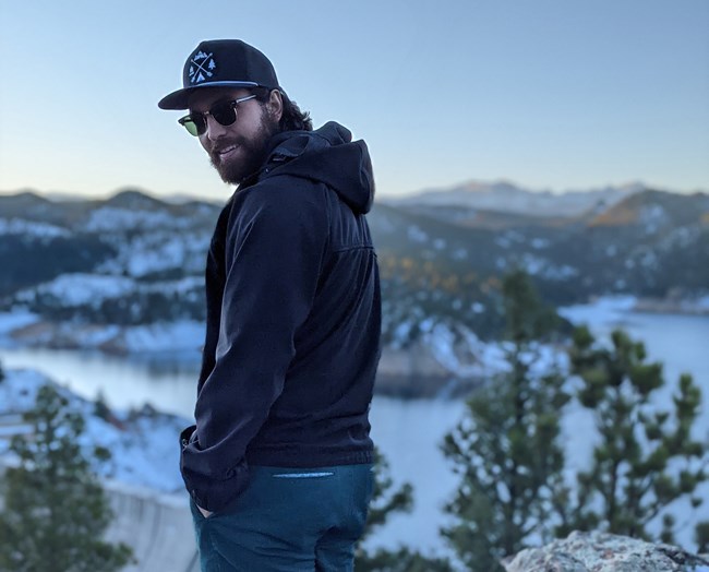 lt= Marcello Arrorio Bebianno Simoes looking over snow covered reservoir