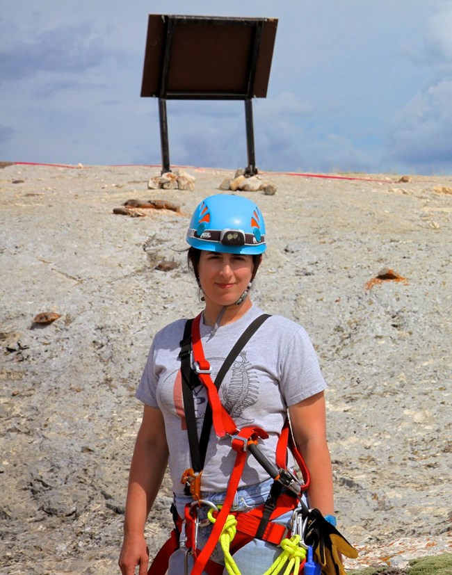 scientist with climbing gear