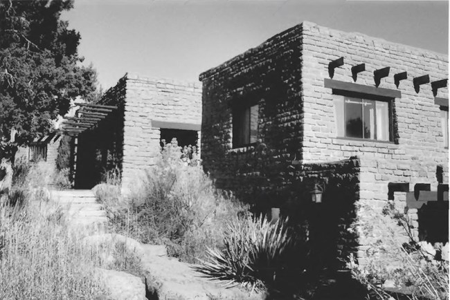 two adobe buildings