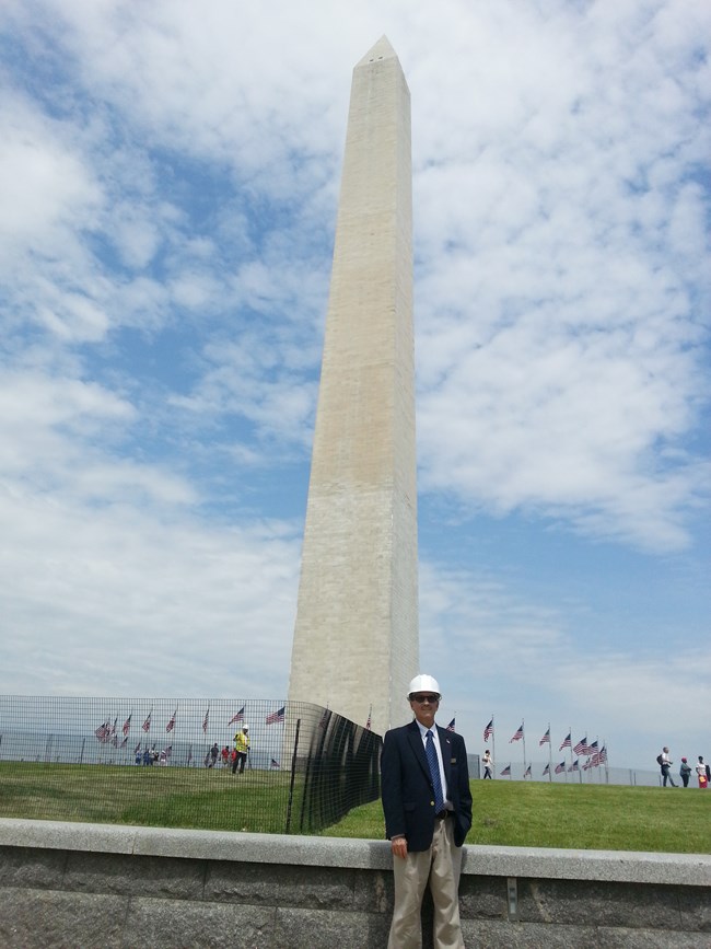 Mike Morelli standing in front of the Washington Monument