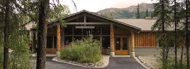 Murie Science and Learning Center - Denali The Murie Science and Learning Center is a quiet log building nestled under coniferous trees.