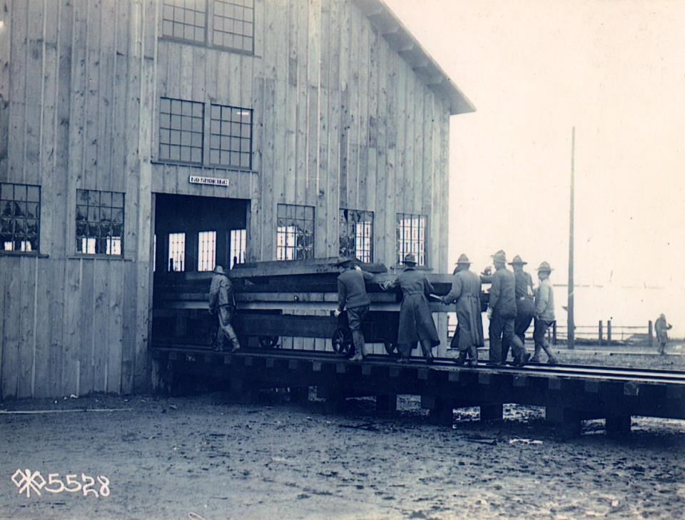 SPD soldiers bringing lumber into mill