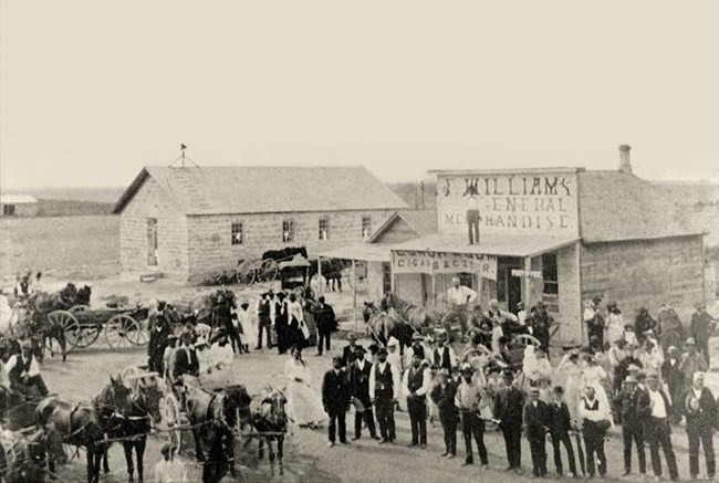 Men and woman gather on Washington Street in 1855