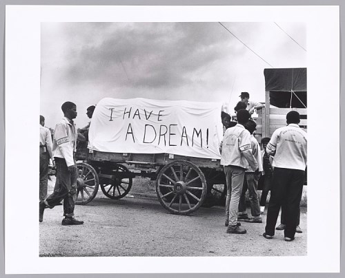Mule Wagon. Mule Wagon. Covered wagon with "I have a dream" written on it.