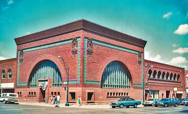 National Farmer's Bank Brick building with arched windows.