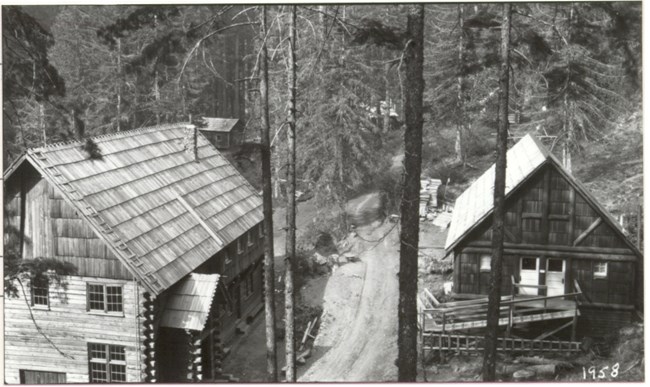 Wooden buildings belonging to the Ohanapecosh Hot Springs Resort. Black and white image of wooden buildings belonging to the Ohanapecosh Hot Springs Resort.