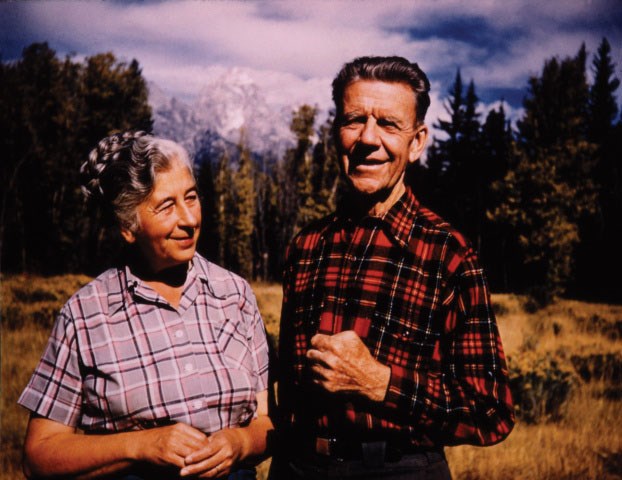 an elderly man and woman smiling