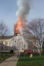 White building on fire.