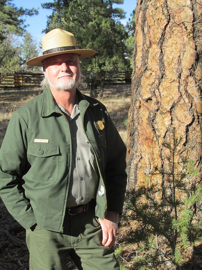 National Park Service employee in uniform with hat