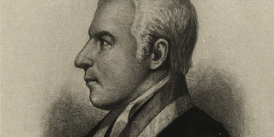 Black and white image of William Paterson on a cream background.