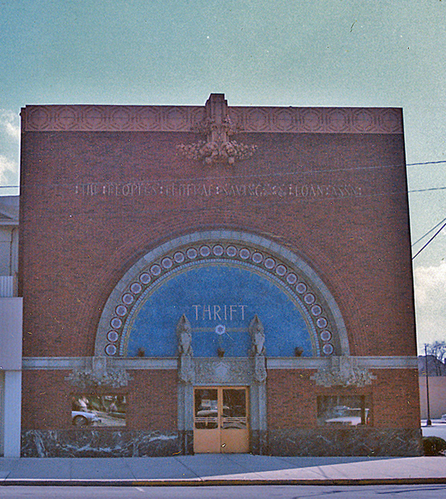 People's Savings and Loan Association Brick building with a large, arched window.