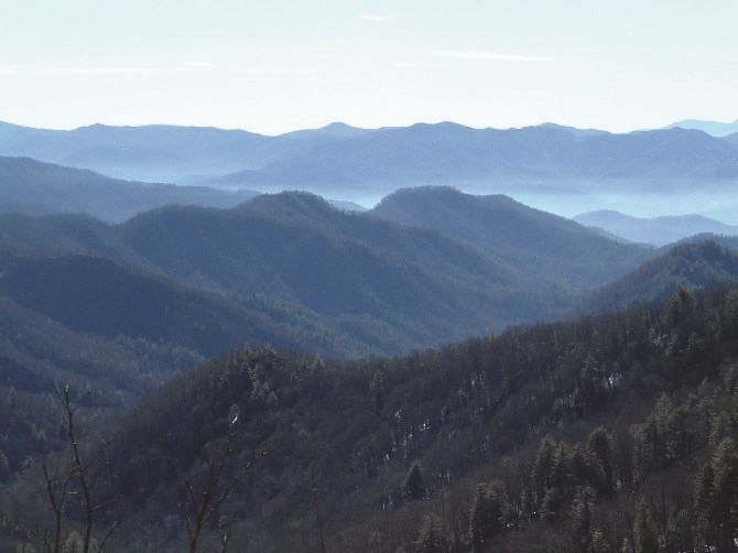 mountain ranges and misty valleys