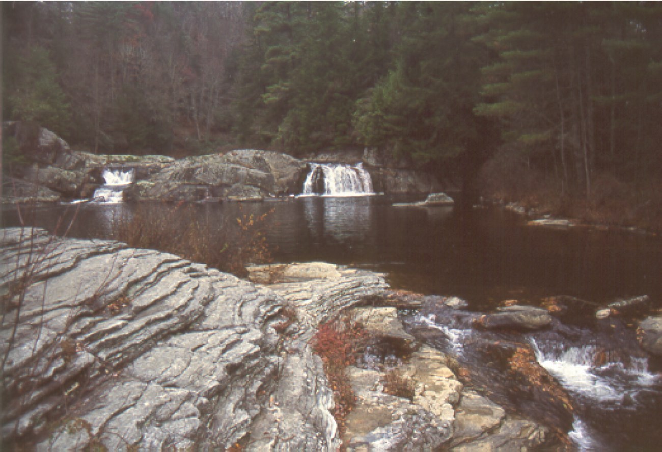 mountain stream with waterfalls