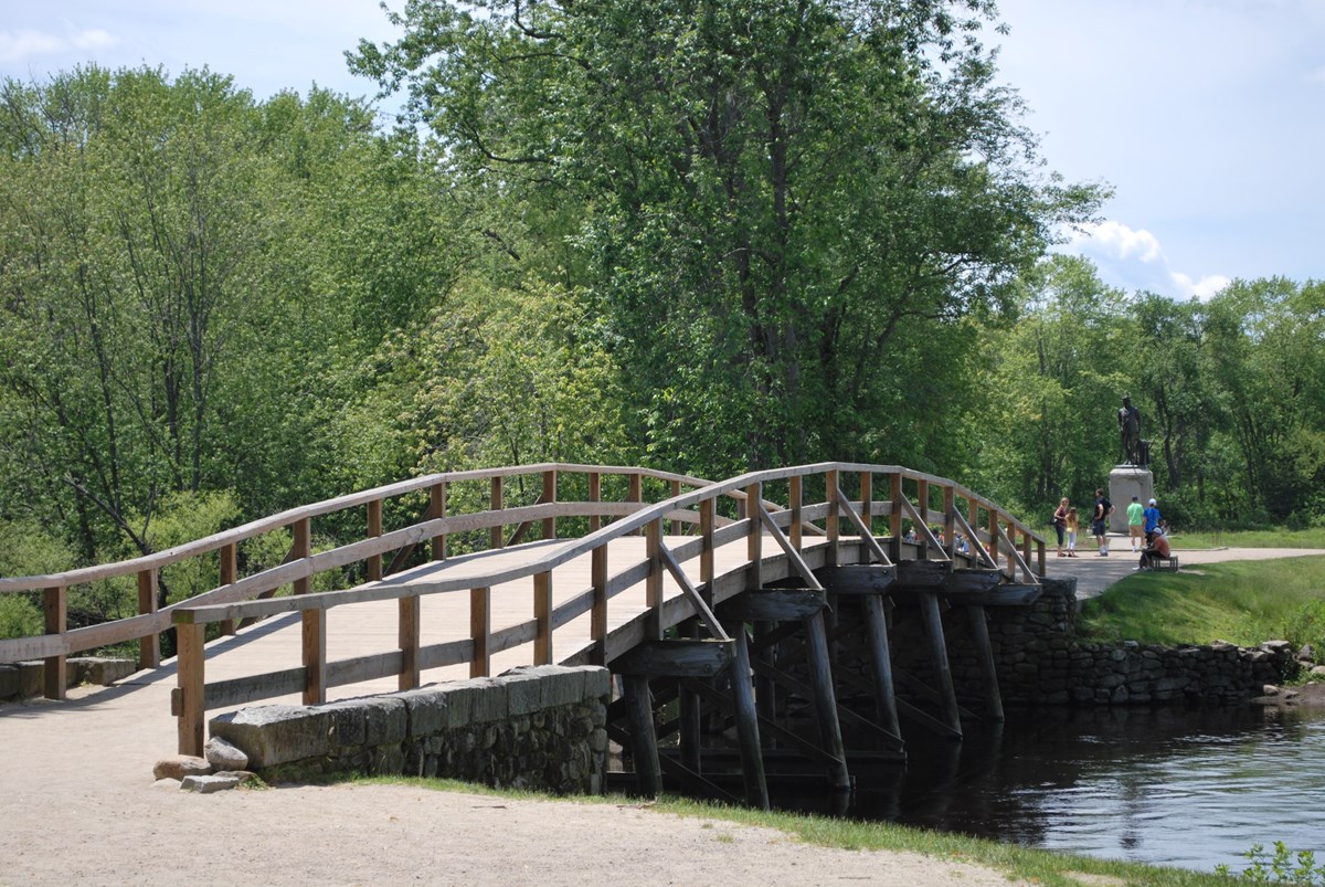 Photo of a bridge across water.