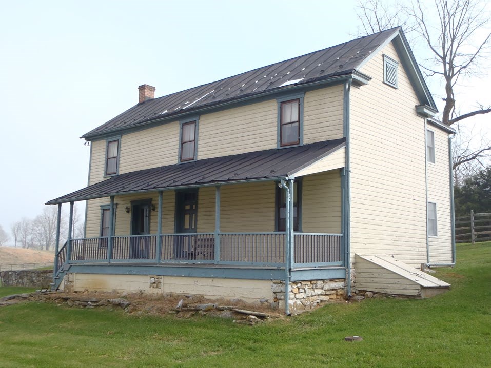 Two-story home with a covered front porch. Two-story home with a covered front porch.