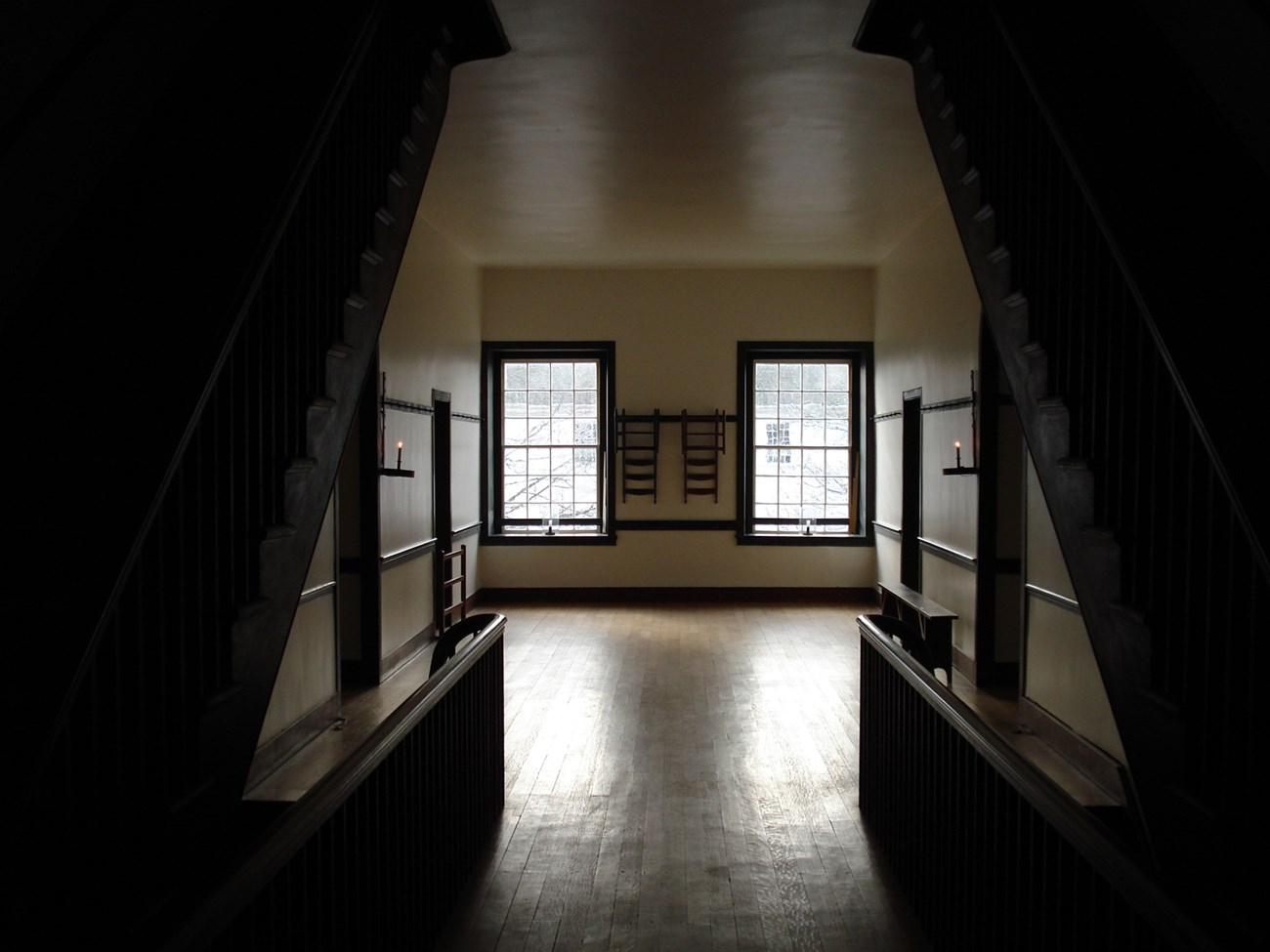 looking towards windows between two staircases