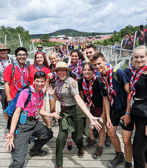 Richmond National Battlefield Park Education Coordinator Stephanie Pooler with scouts at the Jamboree. A park ranger with several scouts