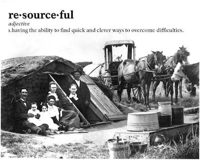 Resourceful Homesteaders sit outside their home