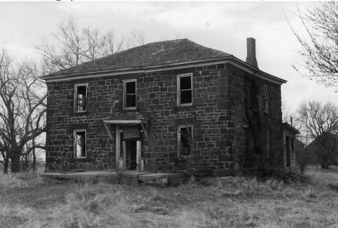 Rev. George B. Hitchcock House B&W photo of a two-story brick house.