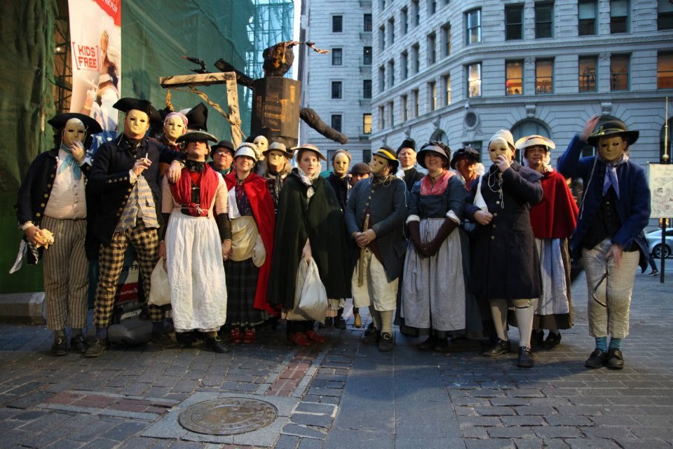 Revolution 250 commemoration People dressed in period costumes in Boston,pose for a photograph.