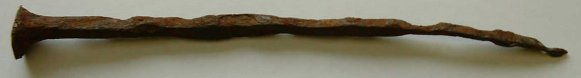 Roman nail Long, brown metal nail.