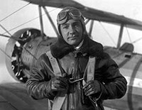 George Menendez Wright in front of airplane