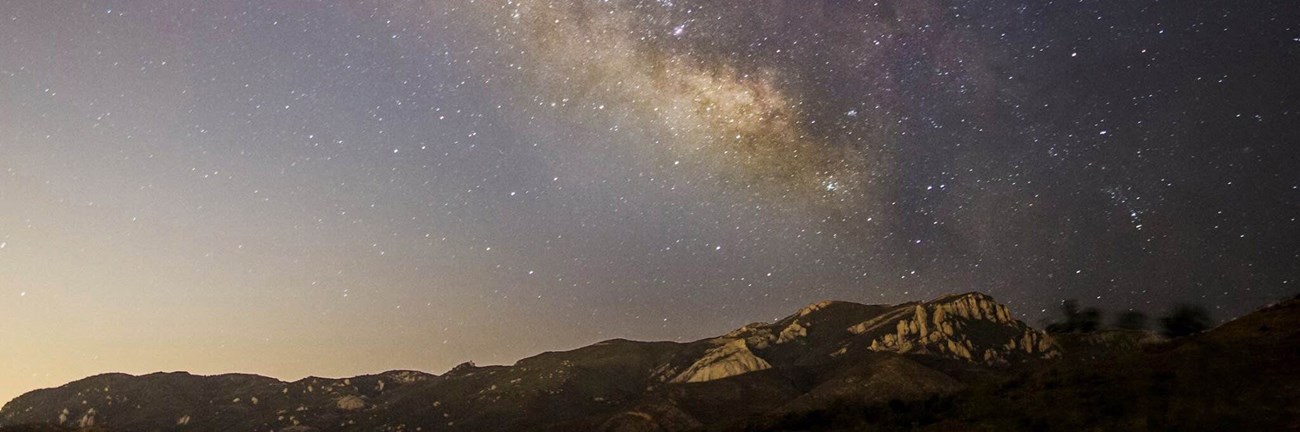 Night sky over Santa Monica Mountains National Recreation Area The Milky Way and light pollution over the mountains of Santa Monica Mountains National Recreation Area.