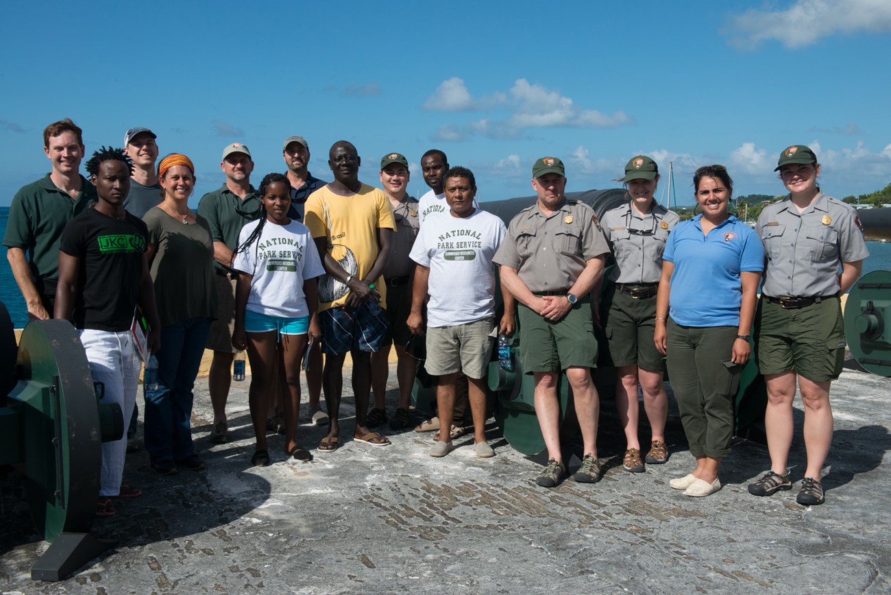Slave Wrecks team at Christiansted NHS A group of people smile at you