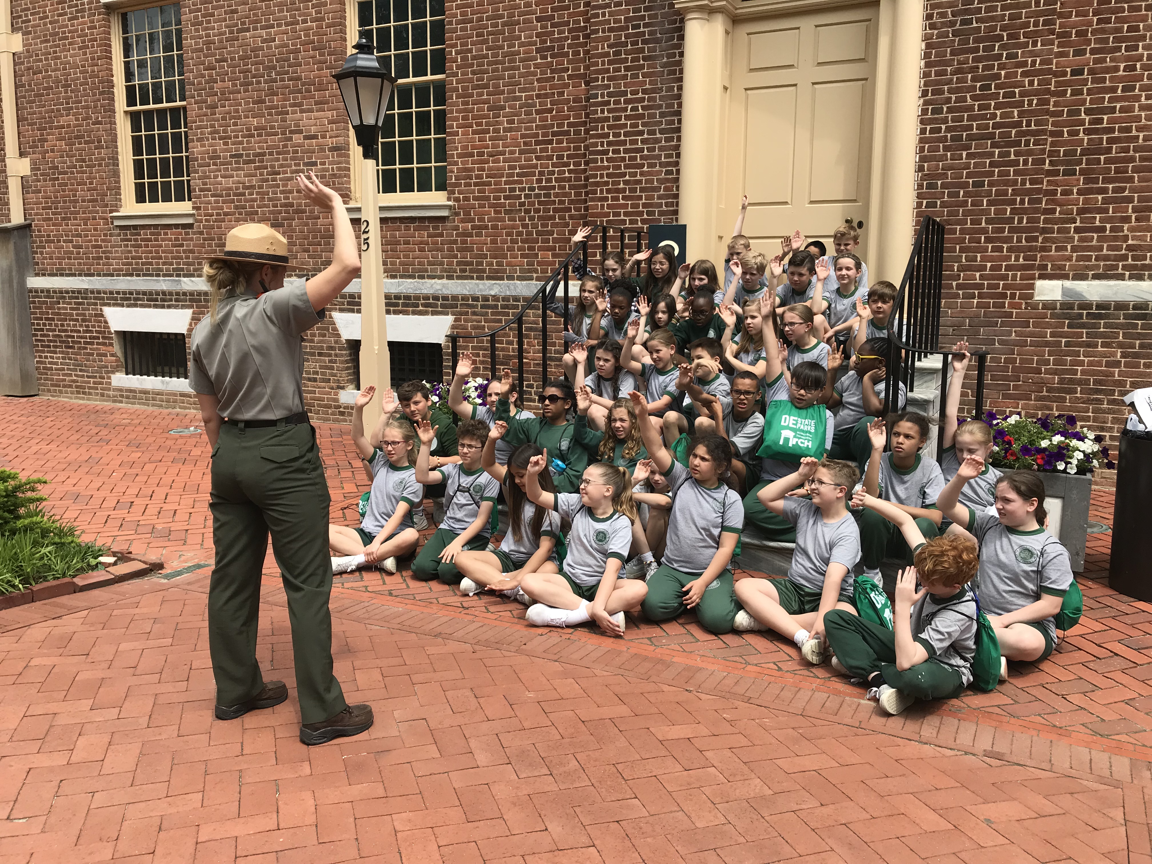 Sam with junior rangers A park ranger swears in a group of 4th-graders.