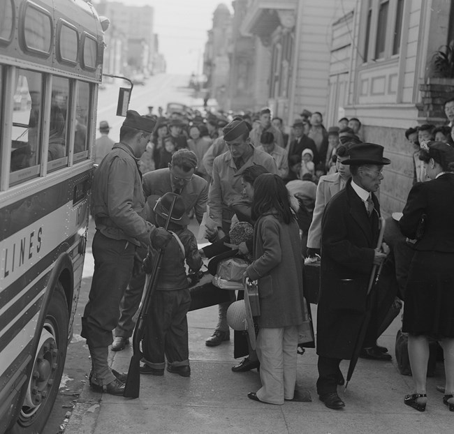 Japanese Americans being forced to leave San Francisco. Japanese Americans being forced to leave San Francisco.