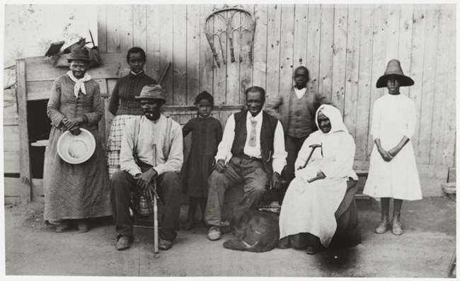 Tubman and Family Tubman stands beside her family members.