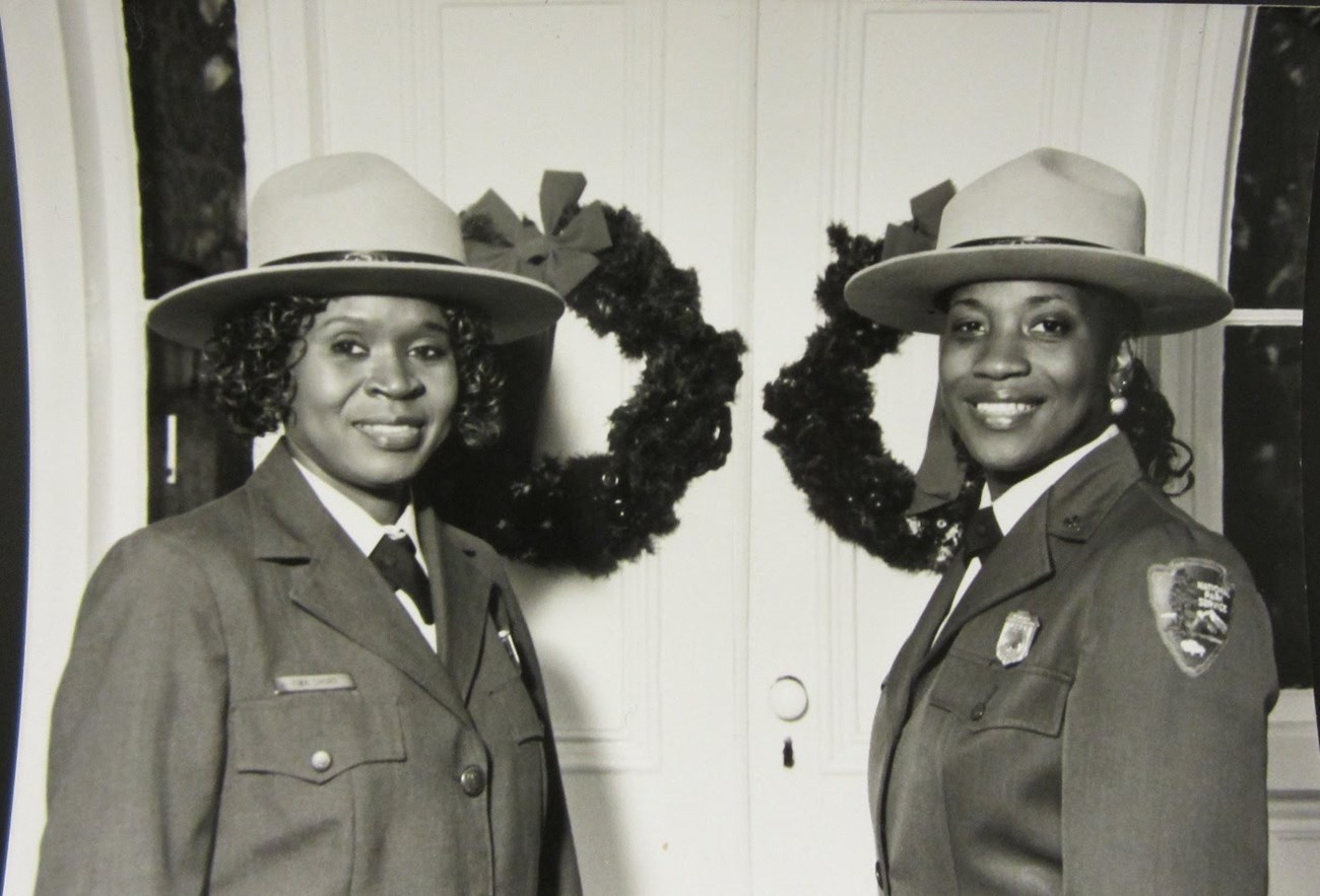 Two women in park ranger uniforms