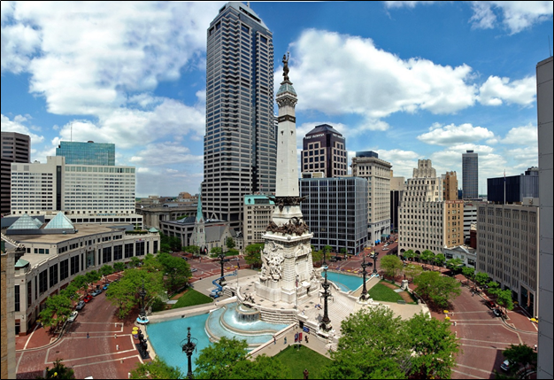 Soldiers and Sailors Monument in downtown Indianapolis. Soldiers and Sailors Monument among large skyscrapers.