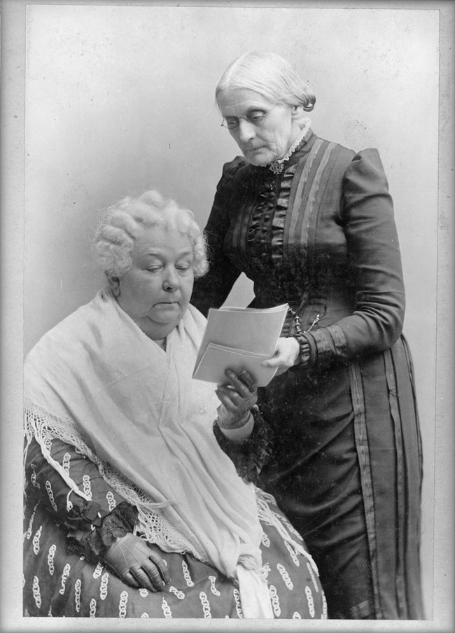 Susan B Anthony and Elizabeth Cady Stanton reviewing document Susan B Anthony and Elizabeth Cady Stanton reviewing document