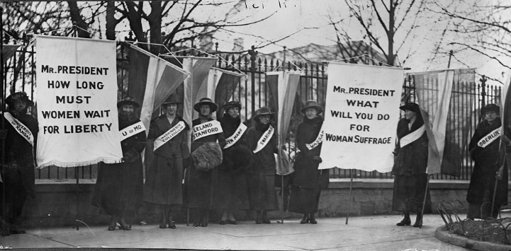 Womens March 1917 Women holding placards for women's suffrage in front of White House