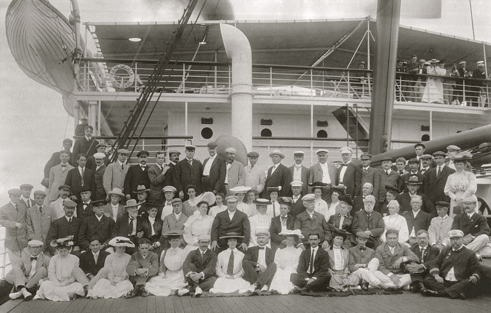 The Taft Diplomatic Mission 1905 Several people sitting and standing for a photo on a ship deck