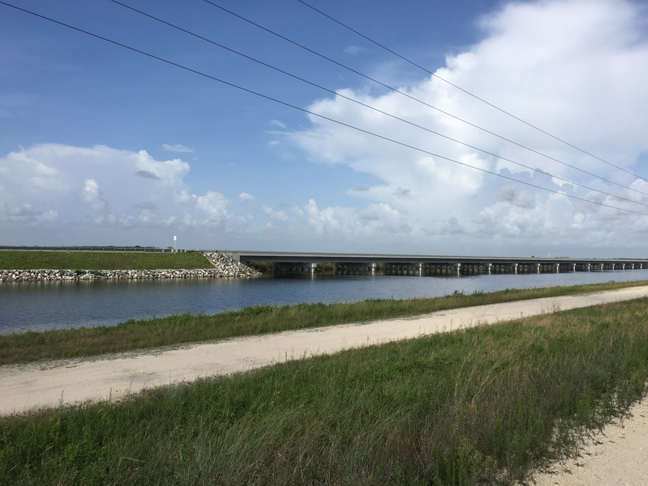 Tamiami 1 mile section completed, 2014, connecting the canal flow to Everglades National Park
