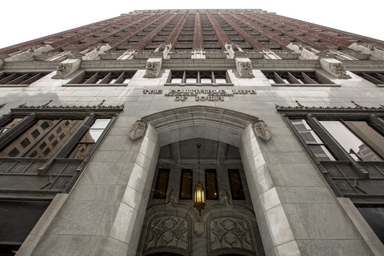 View of the Equitable Life Insurance historic building looking up from the front.