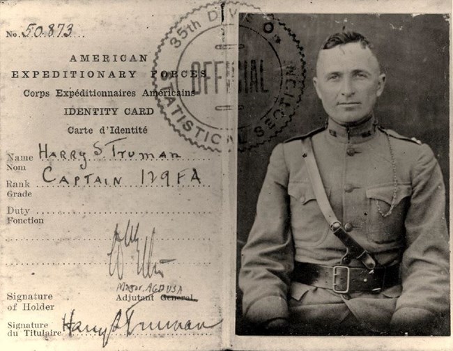 Harry Truman photographed in military uniform with text identifying him as Harry S. Truman, Captain 129 F.A.