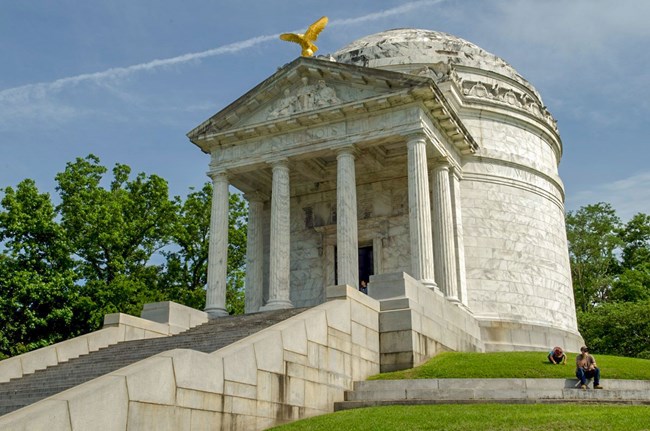 stone memorial building with dome roof