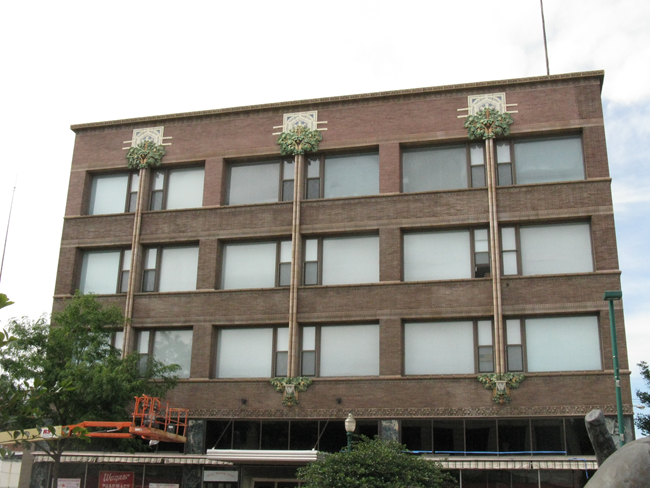 Van Allen Department Store Brick building with large windows and a lot of architectural detail.