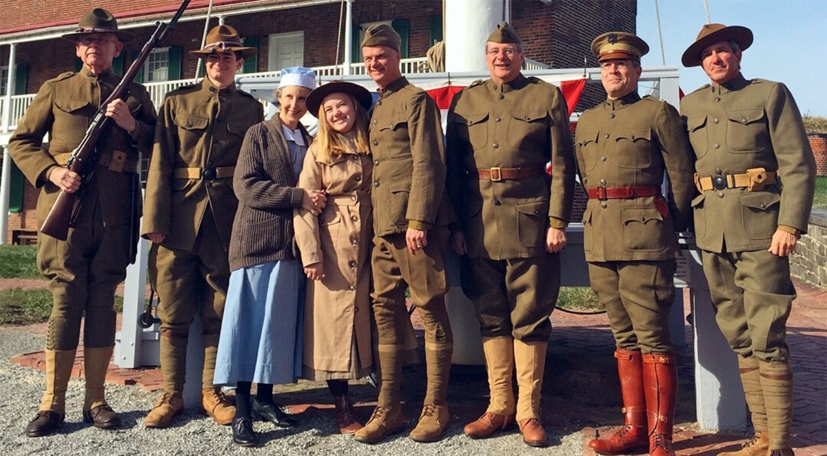 2017 Veterans Day at Fort McHenry Visitors and staff are dressed in WWI uniforms and period costumes, while posing for a photograph.