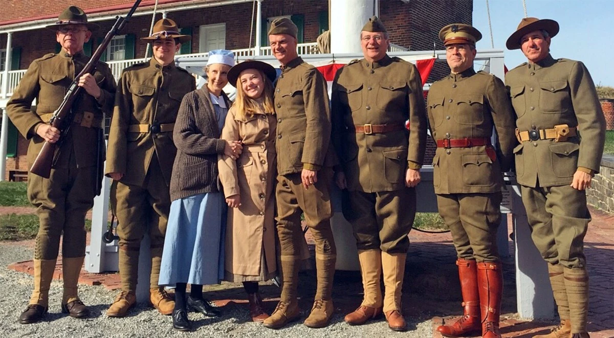 2017 Veterans Day at Fort McHenry Visitors and staff are dressed in WWI uniforms and period costumes, while posing for a photograph.