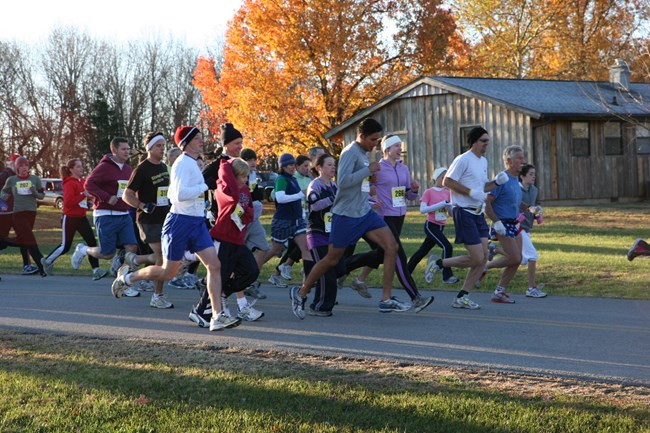 People running on road in race
