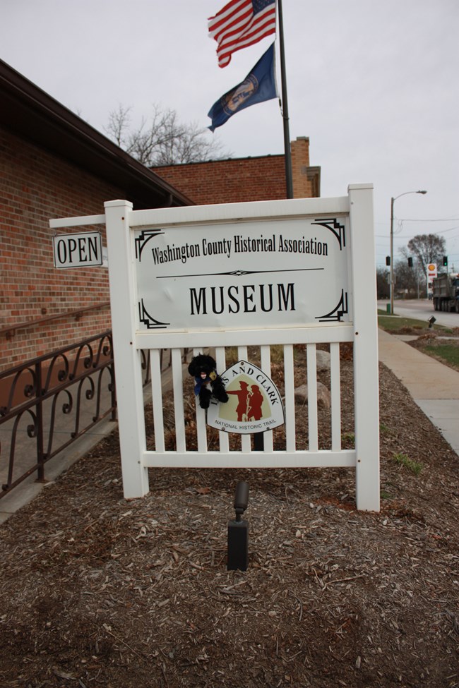 Pup on museum sign